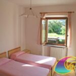 Kamer met twee eenpersoonsbedden Appartement Raffaella