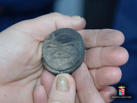 Enkele munten gevonden in het wrak van de Pollux